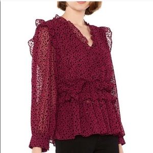 Miss Los Angeles magenta ruffle blouse with black stars. Love how sassy it is!